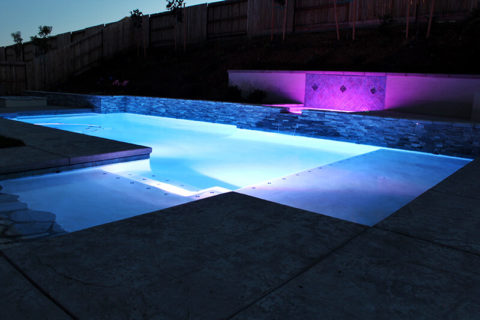 new construction pool at night